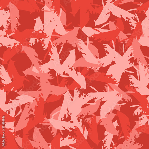 Imitation of camouflage - seamless pattern in different shades of red and pink colors