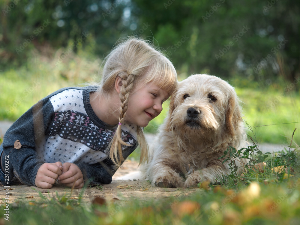 Emotional portrait of a dog and a child Emotional portrait of a dog and a child