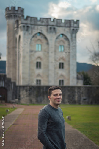model posing with castle