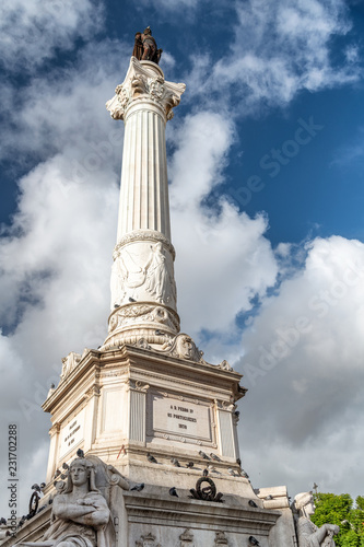 Obelisk in Rossio Square, Lisbon - Portugal photo