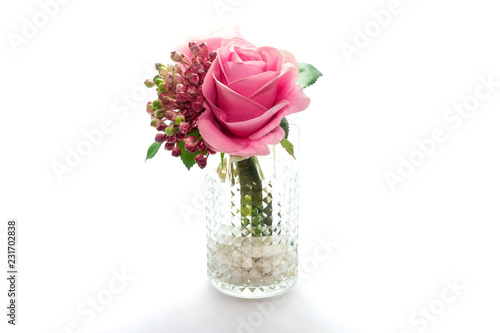 Artificial plastic flowers isolated on white background.