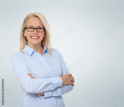 Business woman in glasses and blue shirt isolated on white. Happy pretty women
