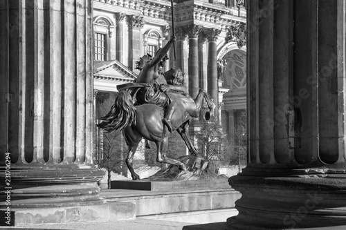 BERLIN, GERMANY, FEBRUARY - 13, 2017: The Dom and the bronze sculpture Amazone zu Pferde in front of Altes Museum by August Kiss (1842).