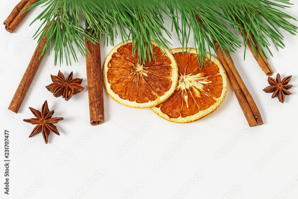 Dry orange fruit. Dried oranges slices, cinnamon sticks, anise star on light background. Spices for hot wine. Background for new year. Dry orange fruit. Dried oranges slices, cinnamon sticks, anise star on light background. Spices for hot wine. Background for new year.