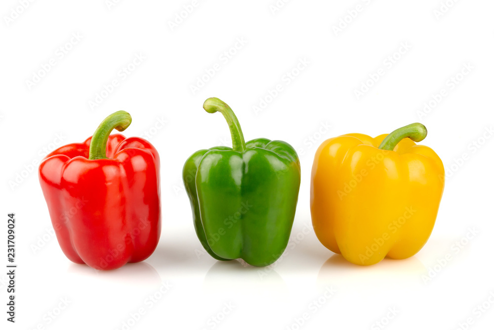 Three different colored of sweet bell peppers (capsicum) isolated on white background. Three different colored of sweet bell peppers (capsicum) isolated on white background.