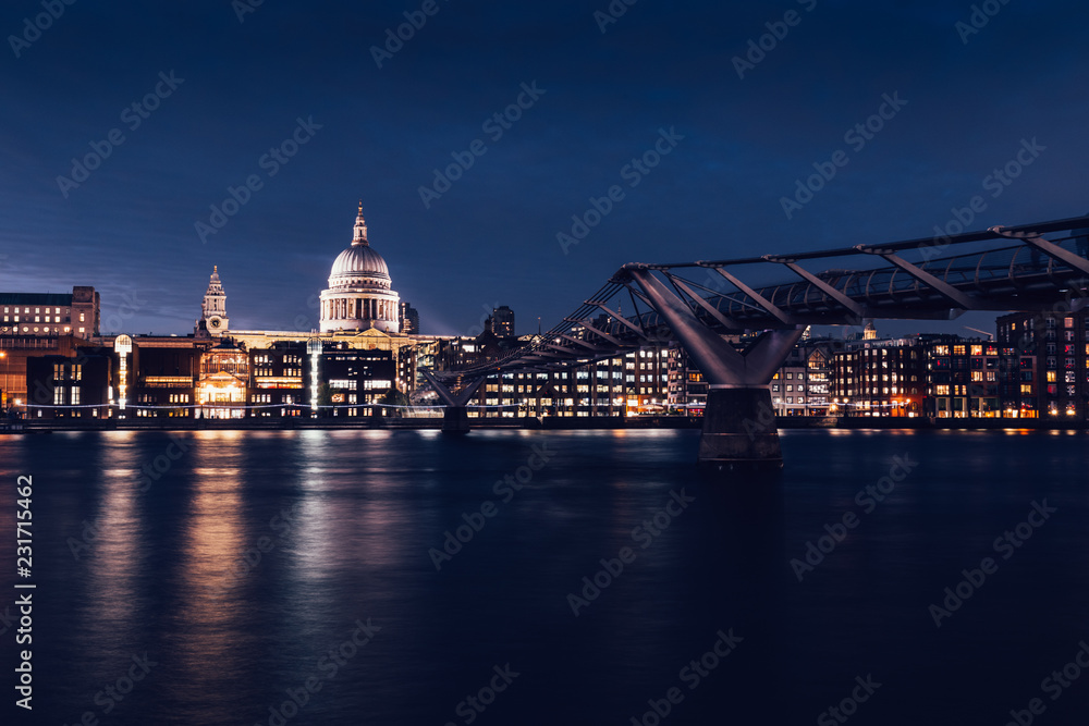 Fototapeta premium Modern London city skyline St Pauls Cathedral and Bridge River Thames at night