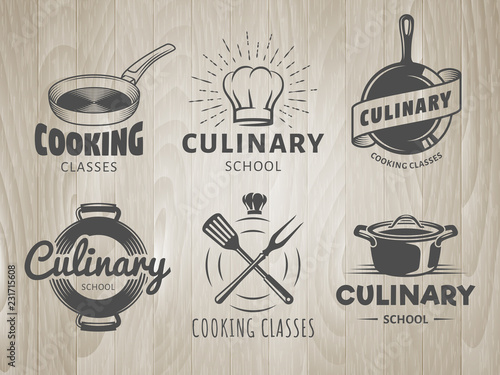 Culinary school logos. Vector labels for cooking classes, workshops and courses. Set of monochrome badges with chefs hat, pans and kitchenware on vintage wooden background