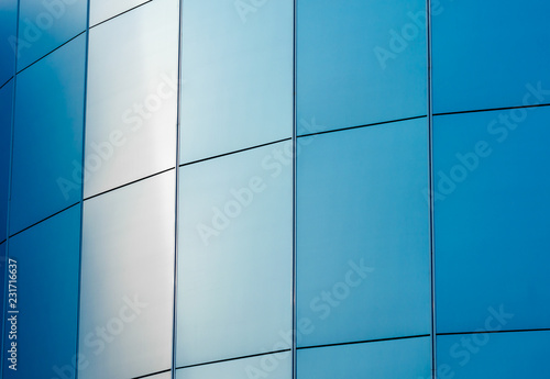 wall of the building with blue panels