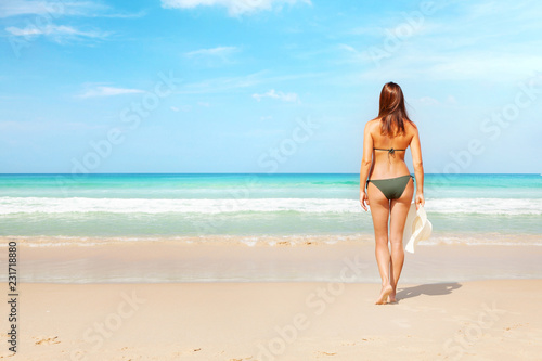 Young attractive woman on the beach
