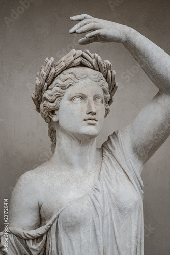 Statue of sensual Roman renaissance era woman in circlet of bay leaves, Potsdam, Germany, details, closeup