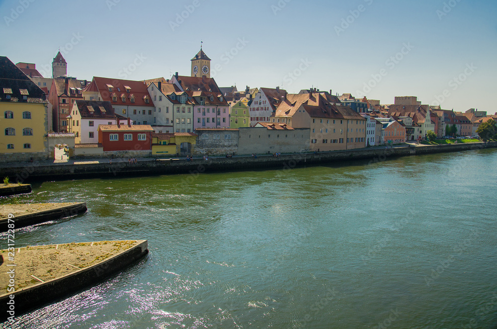 Obraz premium Regensburg, colourful buildings and river Danube in Bavaria, Germany