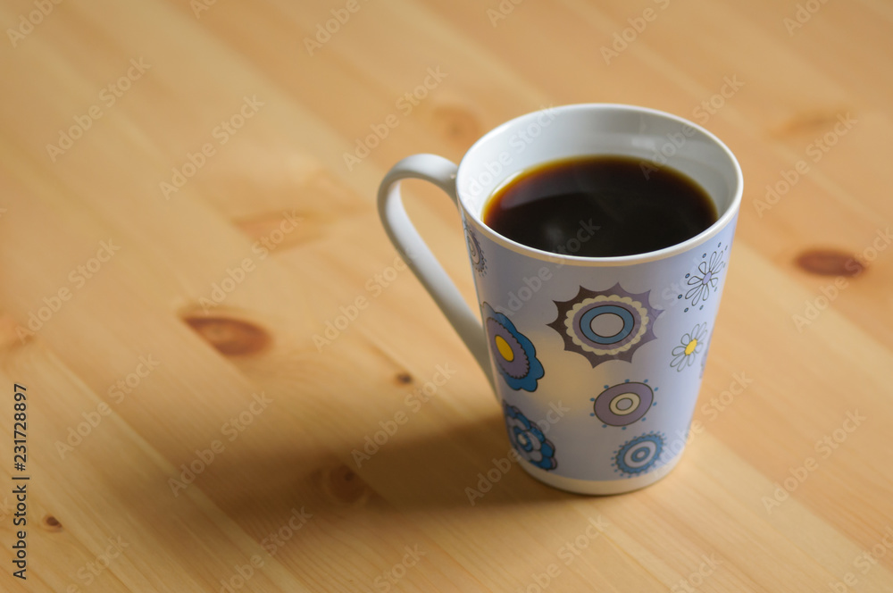 coffee mug on wooden background