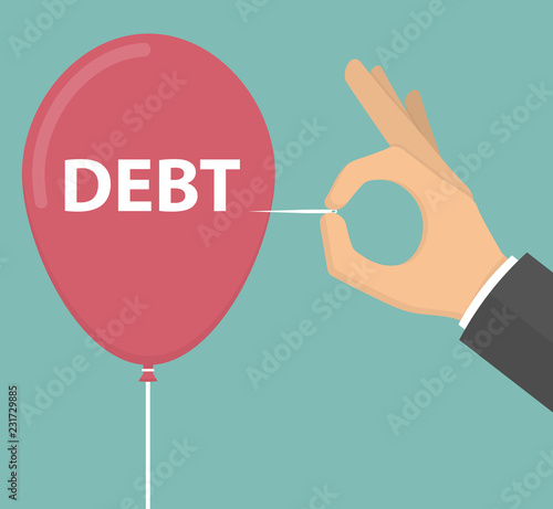 Getting rid of debt concept. Hand with a needle popping out or pricking red ballon with text on it