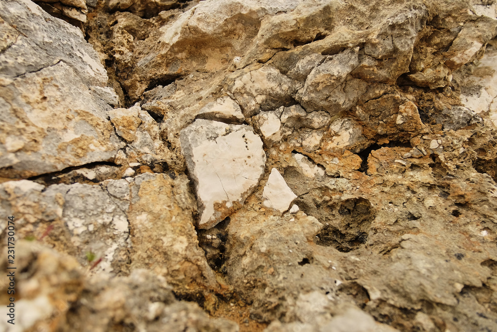 Fototapeta premium brown color natural marble with royal feel texture. cracks in the rocks on the shore