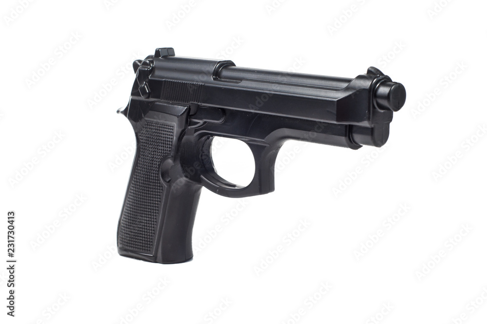 black plastic toy pistols white background