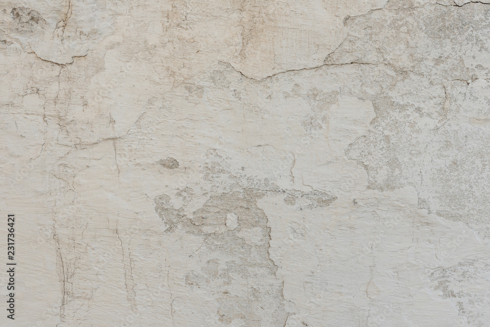 Wall fragment with scratches and cracks. It can be used as a background Wall fragment with scratches and cracks. It can be used as a background