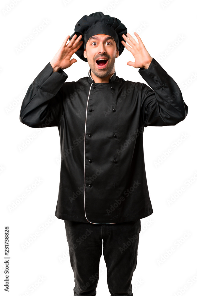 Chef man In black uniform with surprise and shocked facial expression. Gaping because can not believe what is happening on isolated white background Chef man In black uniform with surprise and shocked facial expression. Gaping because can not believe what is happening on isolated white background