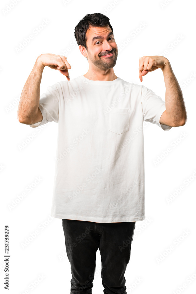 Young man with white shirt pointing down with fingers on isolated white background Young man with white shirt pointing down with fingers on isolated white background