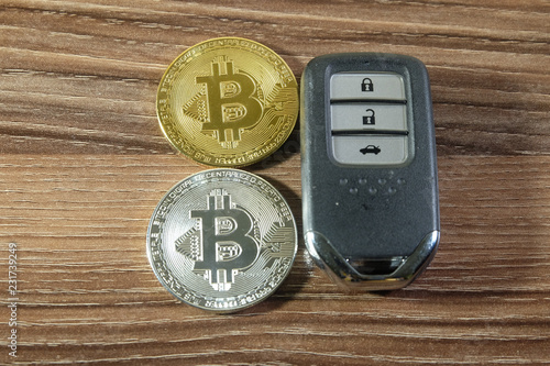 A close up photo of Bitcoin with key.