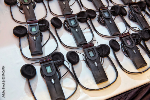 headphones used for simultaneous translation equipment simultaneous interpretation equipment . A set of headphones for simultaneous translation during negotiations in foreign languages.