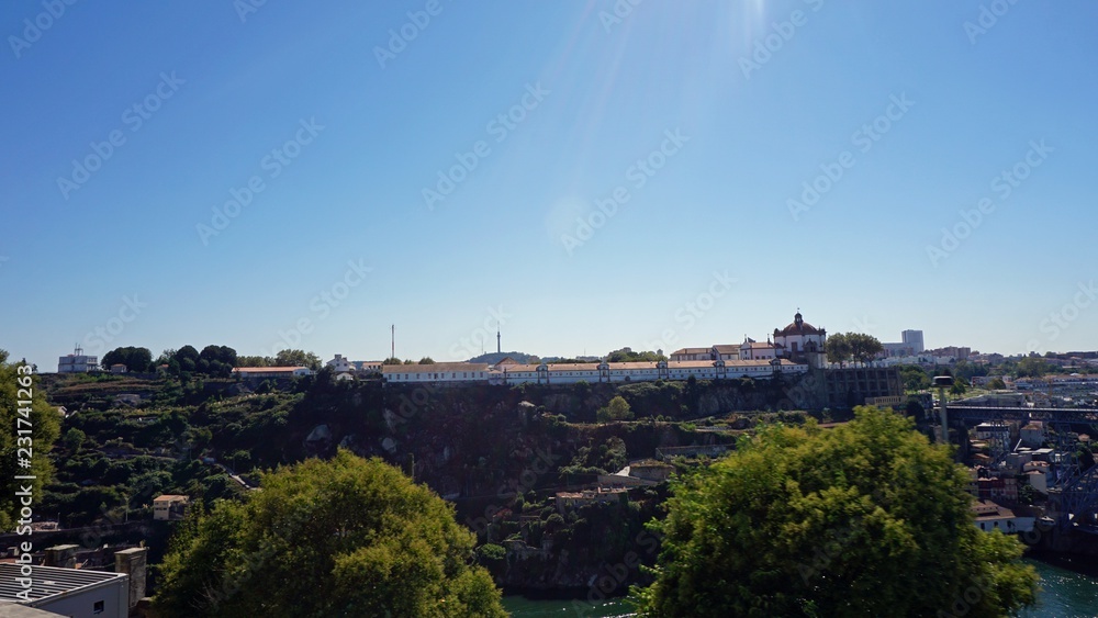 christian monastry on hill over douro river in porto