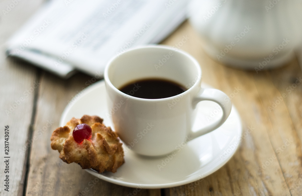 Sweet homemade cookies and cup of coffee on the table, selective focus and copy space Sweet homemade cookies and cup of coffee on the table, selective focus and copy space