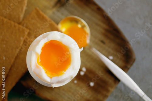 Breakfast. eggs soft-boiled on a gray background. photo