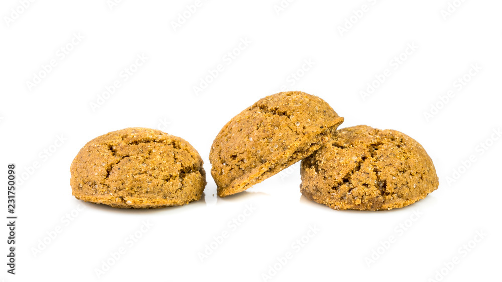 Pepernoten bunch of traditional cookies in a row on white background Pepernoten bunch of traditional cookies in a row on white background