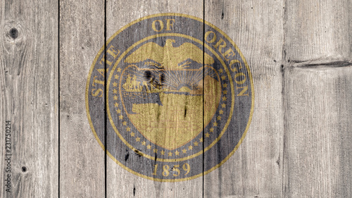 USA Politics News Concept: US State Oregon Seal Wooden Fence Background