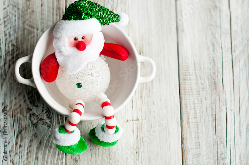 Christmas decor, snowman in the cup, New Year or Christmas concept, cafe banner