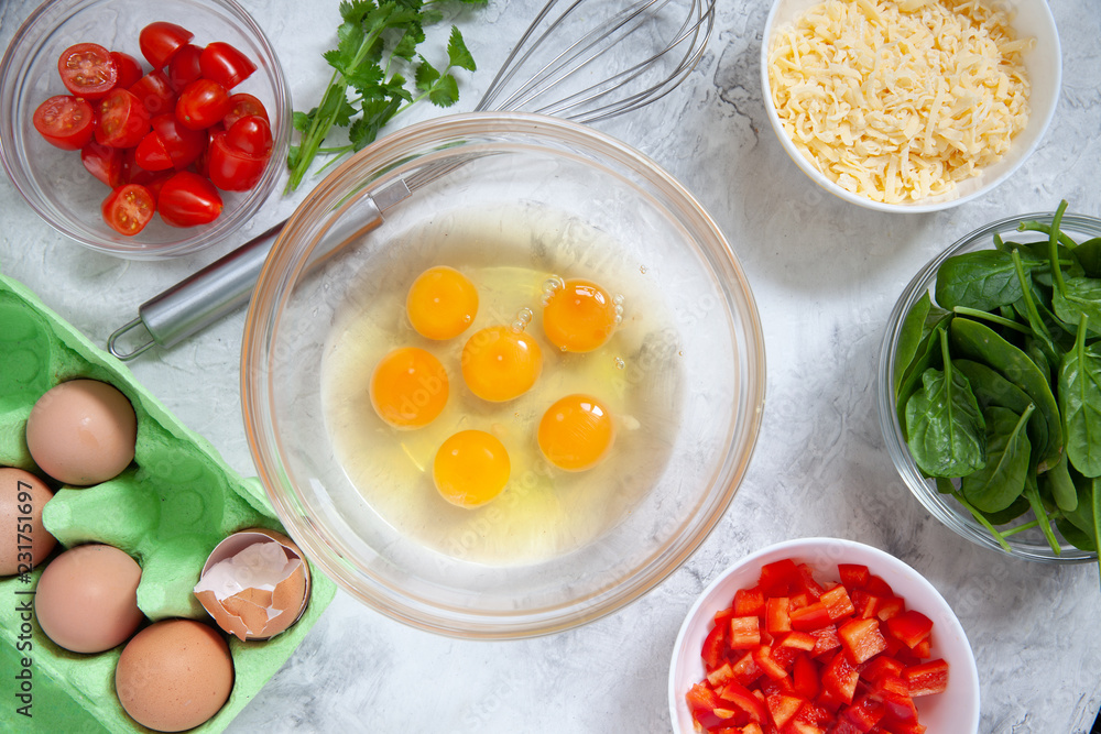 Fresh vegetables, eggs and cheese. Ingredients for healthy breakfast omelet Fresh vegetables, eggs and cheese. Ingredients for healthy breakfast omelet