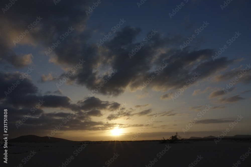 Sunset over the sand dunes in the Natural Park in Fuerteventura,Canary Islands,Spain.
