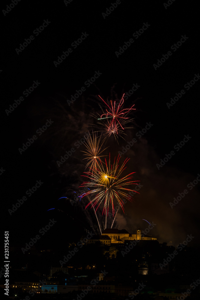 Huge and rich fireworks over the Brno Castle Spilberk, Czech Republic Huge and rich fireworks over the Brno Castle Spilberk, Czech Republic