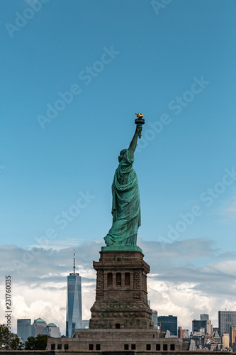 New York City / USA - AUG 22 2018: The statue of liberty in clear blue sky view from river © Edi Chen