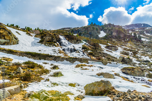 Snow in rocky Alps mountains, Fluelapass, Davos, Graubuenden, S