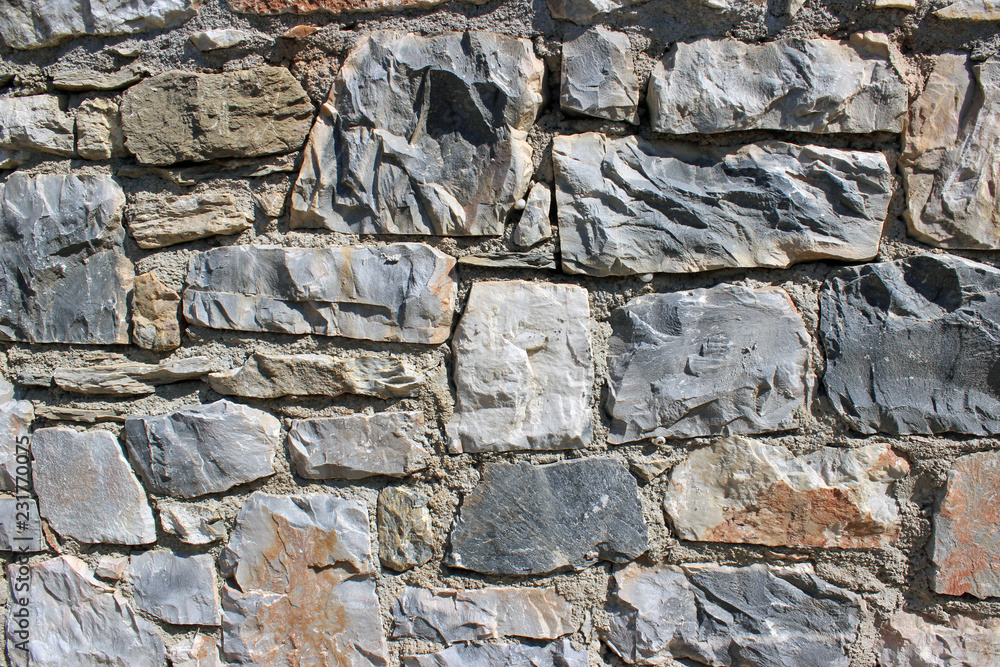 Stone brick wall detail background Stone brick wall detail background