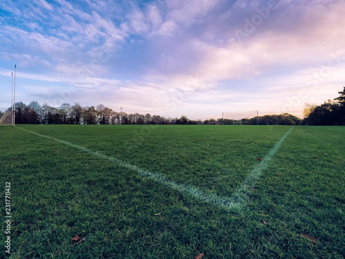 wide angle shot the cornor of football filed on morning time