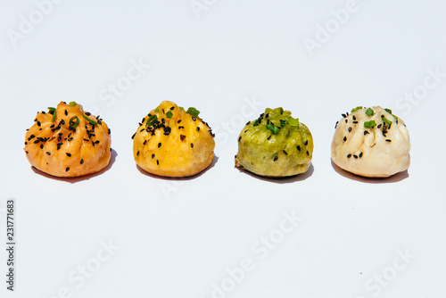 Bao dumplings on white background photo