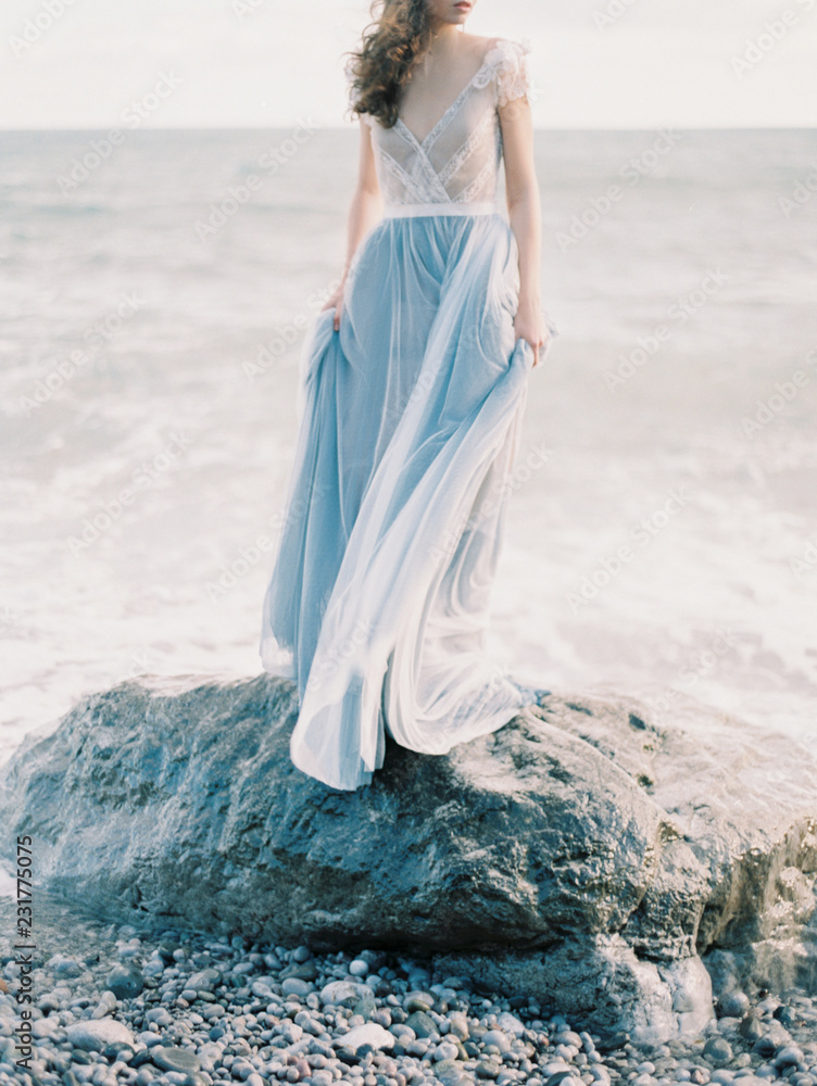 Feminine model in light dress Feminine model in light dress