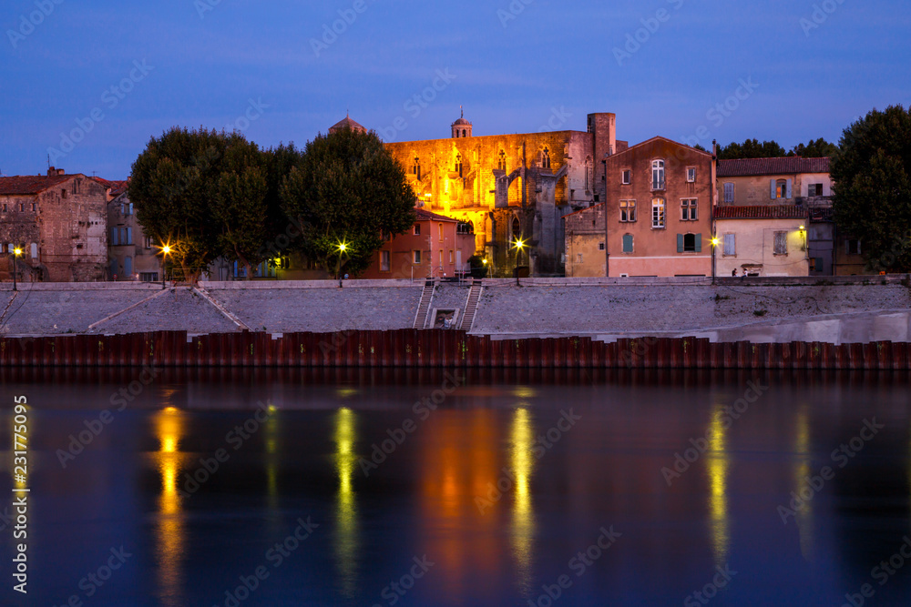 Arles, view to historical town from the river. Twilight, Arles, Provence-Alpes-Cote d'Azur, France.