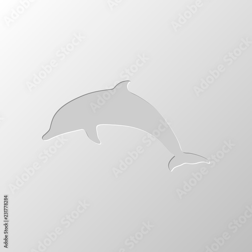 silhouette of dolphin. Paper design. Cutted symbol. Pitted style