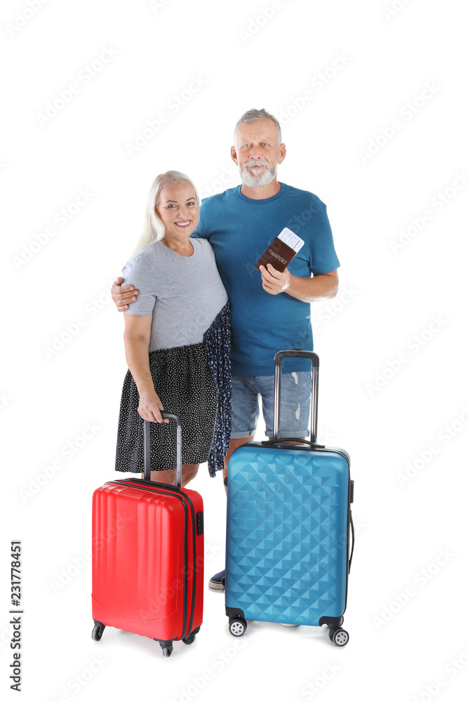 Senior couple with suitcases and passport on white background Senior couple with suitcases and passport on white background