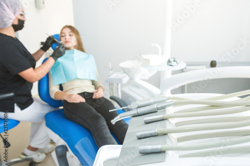 Dental clinic. Reception  examination of the patient. Teeth care. Modern dental equipment.