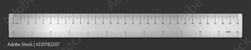 Realistic metal tape ruler isolated on black. Double sided measurement in cm and inches. Vector illustration