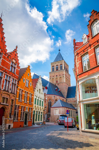 Church of Saint Giles and traditional narrow streets in Bruges (Brugge), Belgium