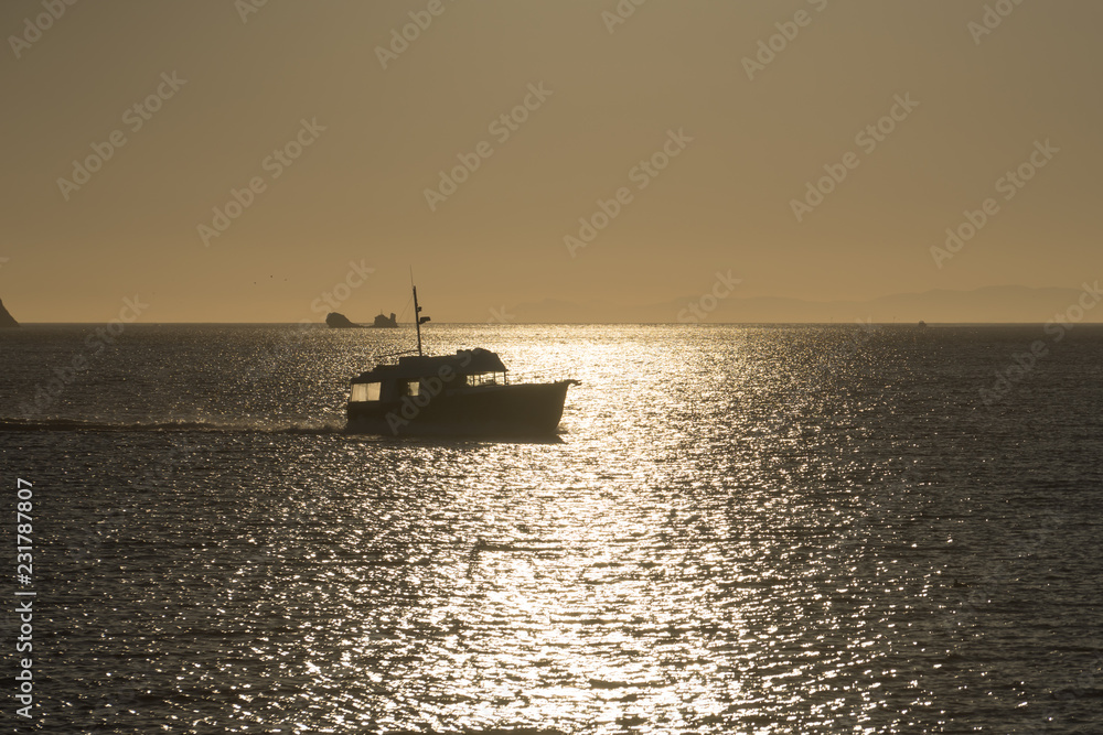 seascape with a boat on the background of the sea. seascape with a boat on the background of the sea.