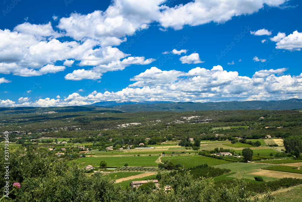 View of the countryside of the Luberon as seen from the medieval village of Menerbes in Provence, France