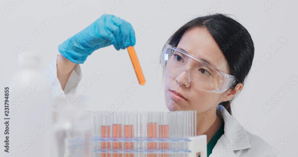 Scientist doing reseach in Laboratory Scientist doing reseach in Laboratory