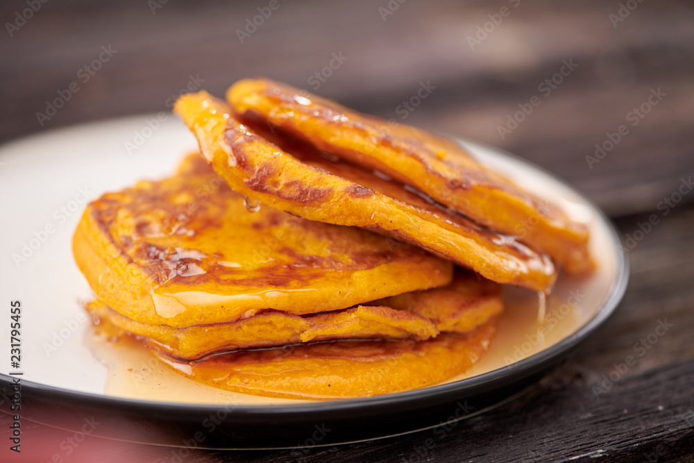 pancake with honey on wooden background pancake with honey on wooden background