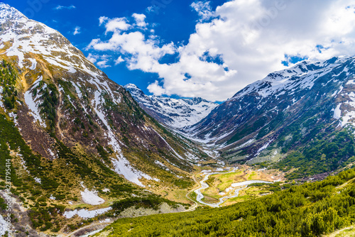 Mountain river in Alps covered with snow  Fluelapass  Zernez  Gr